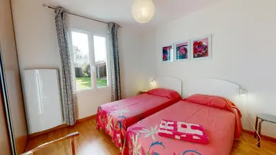 Un ou plusieurs lits dans un hébergement de l'établissement Villa Terre et Mer avec piscine privee