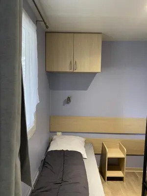 Un ou plusieurs lits dans un hébergement de l'établissement Mobil Home cosy 5 personnes proche du Puy Du Fou
