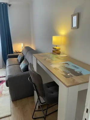 Coin salon dans l'établissement Chambre Privée chez L' Habitant