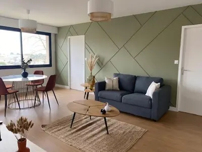 Coin salon dans l'établissement L'Échappée Belle - Appartement charmant et chaleureux