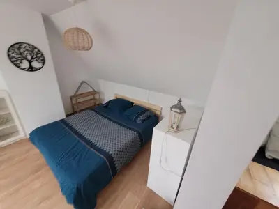 Un ou plusieurs lits dans un hébergement de l'établissement Le jardin de lumière -chambre2