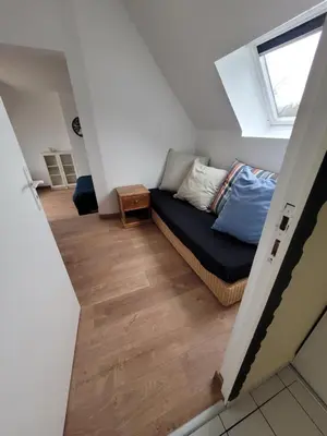 Un ou plusieurs lits dans un hébergement de l'établissement Le jardin de lumière -chambre2