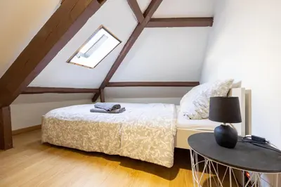 Un ou plusieurs lits dans un hébergement de l'établissement Le petit duplex du Paul B