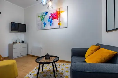 Télévision ou salle de divertissement dans l'établissement Le petit duplex du Paul B