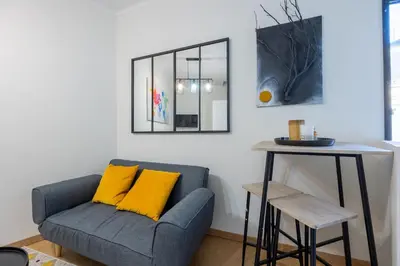 Coin salon dans l'établissement Le petit duplex du Paul B