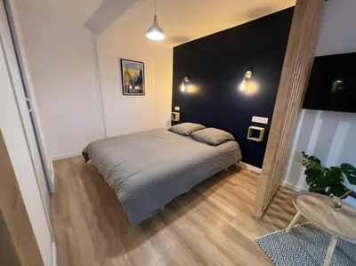 Un ou plusieurs lits dans un hébergement de l'établissement Studio 1 - Mi-Côte - Studio à Orvault