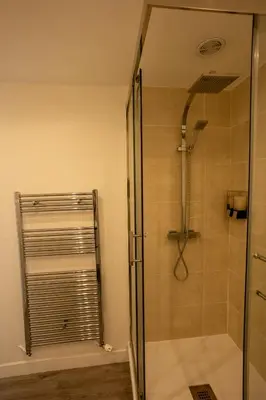 Salle de bains dans l'établissement Le Zéphyr - Charme Urbain & Confort