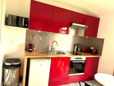Cuisine ou kitchenette dans l'établissement Grand studio, belle terrasse avec vue