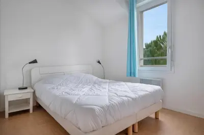Un ou plusieurs lits dans un hébergement de l'établissement 400m de la plage des Sables d'Or - Maison pour 8