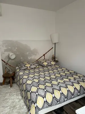 Un ou plusieurs lits dans un hébergement de l'établissement Chambre d hôte