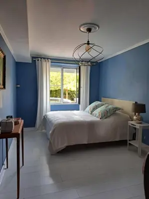 Un ou plusieurs lits dans un hébergement de l'établissement Gîte Marguerite - Au coeur de la campagne