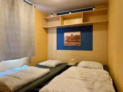 Un ou plusieurs lits dans un hébergement de l'établissement Mobile home 6 personnes Climatisé proche Puy du fou Clisson 800FA