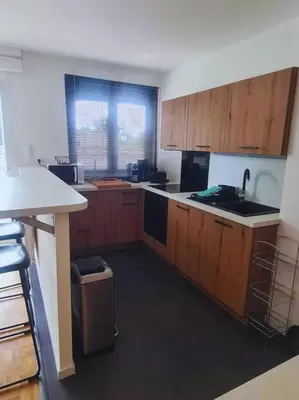 Cuisine ou kitchenette dans l'établissement T4 proche de tout ! Séjour parfait garanti