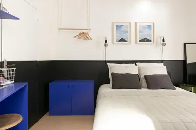Un ou plusieurs lits dans un hébergement de l'établissement Chambre avec salle de bain et accès indépendant
