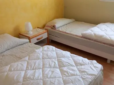 Un ou plusieurs lits dans un hébergement de l'établissement Appartement 2 Ch. Vue Mer, Parking Privé à Saint-Jean-de-Monts - FR-1-323-334