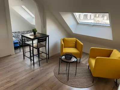 Coin salon dans l'établissement Studio 304 - Hyper Centre - Intégralement rénové - Toutes commodités à pied