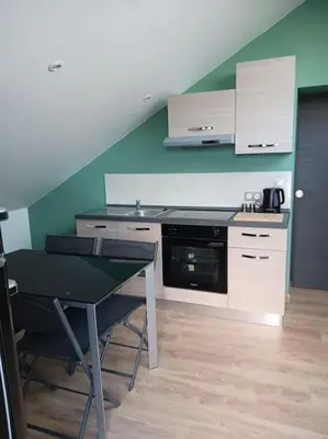 Cuisine ou kitchenette dans l'établissement le calme atlantique