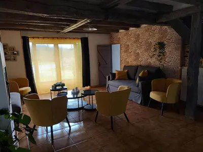 Coin salon dans l'établissement Gites de la Janais