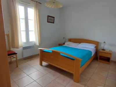 Un ou plusieurs lits dans un hébergement de l'établissement Maison 2 Chambres avec Piscine Privée à Saint Jean de Monts - FR-1-323-439