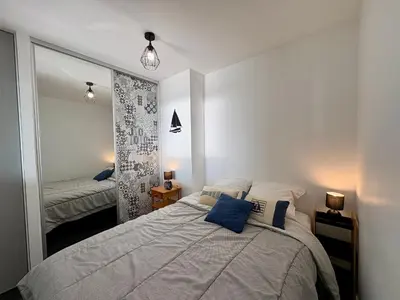 Un ou plusieurs lits dans un hébergement de l'établissement Appartement confortable, face à la mer, animaux admis - FR-1-323-449