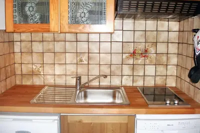 Cuisine ou kitchenette dans l'établissement Maison accueillante à Saint-Jean-de-Monts avec terrasse