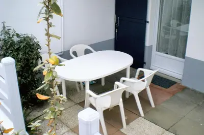 Balcon ou terrasse dans l'établissement Maison accueillante à Saint-Jean-de-Monts avec terrasse