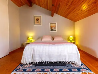 Un ou plusieurs lits dans un hébergement de l'établissement Holiday Home L'Oiseau Bleu by Interhome