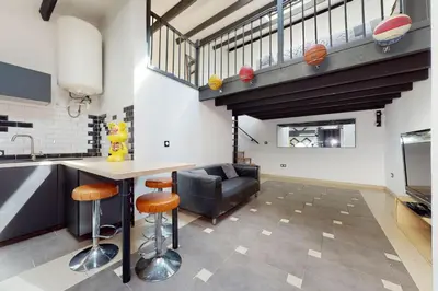 Cuisine ou kitchenette dans l'établissement Superbe appartement meublé proche gare et centre ville