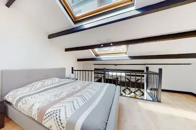 Un ou plusieurs lits dans un hébergement de l'établissement Superbe appartement meublé proche gare et centre ville