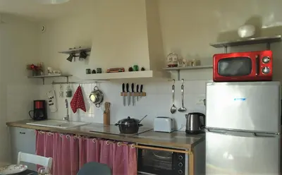 Cuisine ou kitchenette dans l'établissement Bienvenue à la halte de Sigournais ancienne Gare