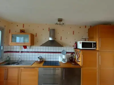 Cuisine ou kitchenette dans l'établissement Appartement 2 chambres pour 6 personnes - Face mer - Spacieux - Saint-Jean-de-Monts - FR-1-323-297