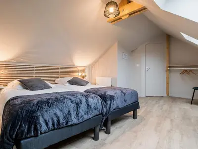 Un ou plusieurs lits dans un hébergement de l'établissement Gîte Familial Rénové, Proche Canal, Terrasse, Jardin, et Verger Commun, à 20 km de Nantes - FR-1-306-1262