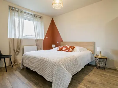 Un ou plusieurs lits dans un hébergement de l'établissement Gîte Familial Rénové, Proche Canal, Terrasse, Jardin, et Verger Commun, à 20 km de Nantes - FR-1-306-1262