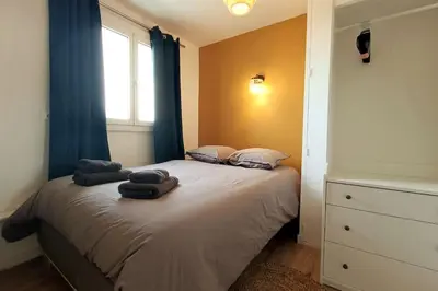 Un ou plusieurs lits dans un hébergement de l'établissement Le Yellow Corner - Place Ney