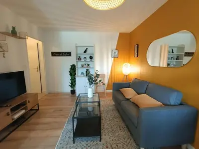 Télévision ou salle de divertissement dans l'établissement Le Yellow Corner - Place Ney