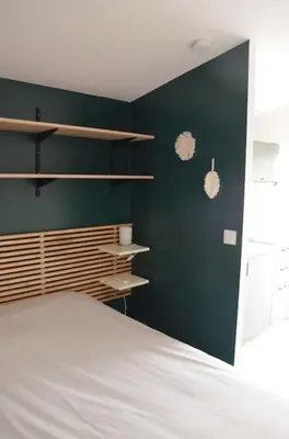 Un ou plusieurs lits dans un hébergement de l'établissement Studio confortable avec terrasse privée