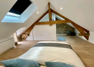 Un ou plusieurs lits dans un hébergement de l'établissement Maison de ville