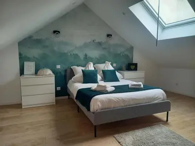 Un ou plusieurs lits dans un hébergement de l'établissement Maison de ville