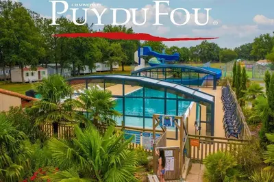 Piscine de l'établissement Mobil home Clim PUY du FOU 2Chb / 5Pers ou située à proximité