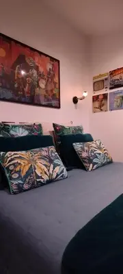 Un ou plusieurs lits dans un hébergement de l'établissement Claire & Co Chambre d'hôtes