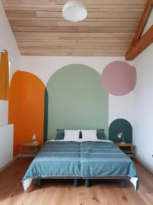 Un ou plusieurs lits dans un hébergement de l'établissement Superbe maison de campagne à deux pas de Nantes