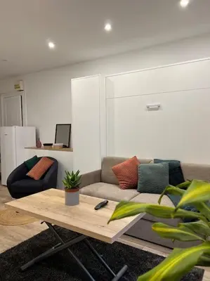 Coin salon dans l'établissement * Cosy & Netflix Proche Centre *