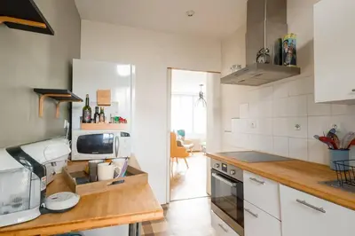 Cuisine ou kitchenette dans l'établissement Le Terminus