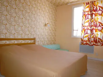 Un ou plusieurs lits dans un hébergement de l'établissement Vacances à Saint-Jean-de-Monts : Pavillon intime 6 pers., proche plage et commerces - FR-1-323-369