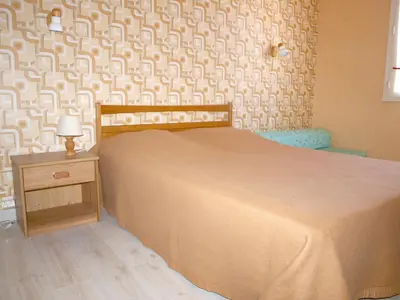 Un ou plusieurs lits dans un hébergement de l'établissement Vacances à Saint-Jean-de-Monts : Pavillon intime 6 pers., proche plage et commerces - FR-1-323-369