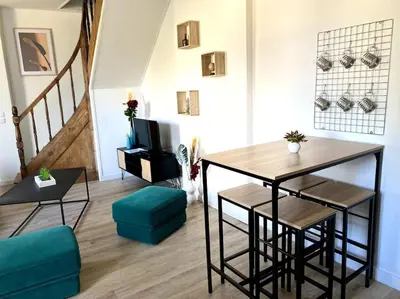 Coin salon dans l'établissement Appartement 2chambres/PuyDuFou