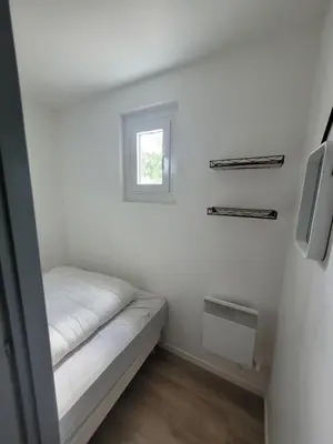Un ou plusieurs lits dans un hébergement de l'établissement Sérénité Marine : Maison en Bord de Mer à Notre Dame de Monts