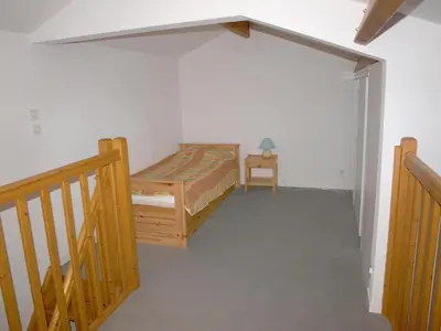 Un ou plusieurs lits dans un hébergement de l'établissement Maison familiale à Saint-Jean-de-Monts, piscine commune, parking privé - FR-1-323-377
