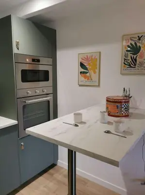 Cuisine ou kitchenette dans l'établissement Gîte 