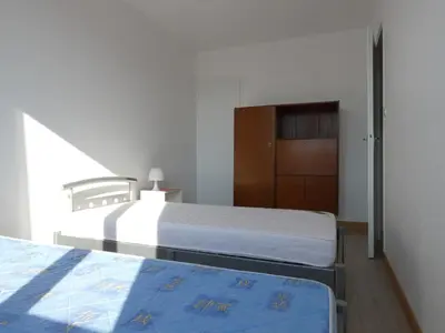 Un ou plusieurs lits dans un hébergement de l'établissement Maison 2 Chambres près Plage et Commerces - Parking Privé - FR-1-323-366